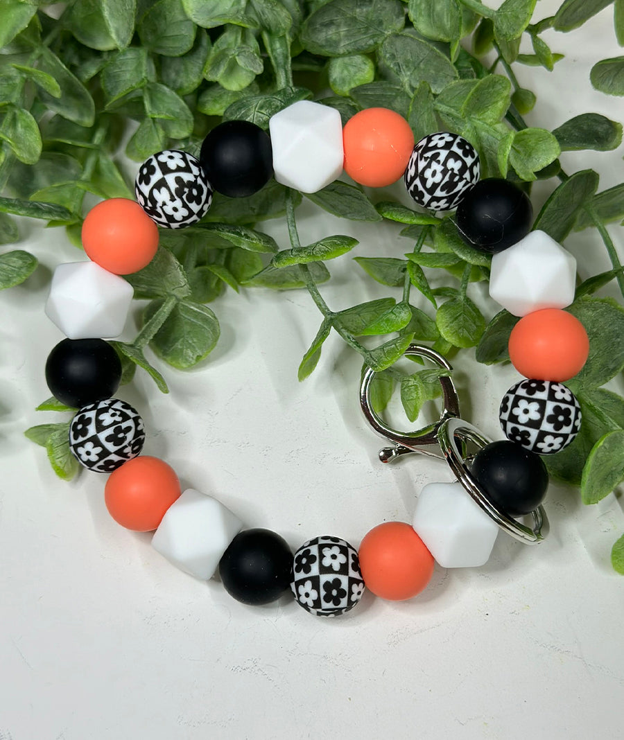 Retro Daisy Coral Wristlet